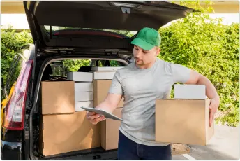 Equipment being unloaded from a SureMed delivery van in Houston