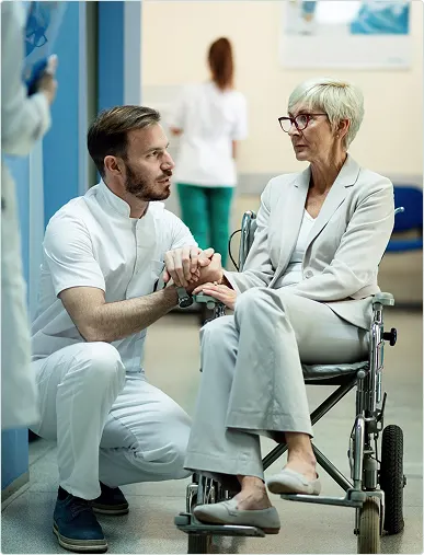SureMed technician showing a caregiver how to use a walker safely